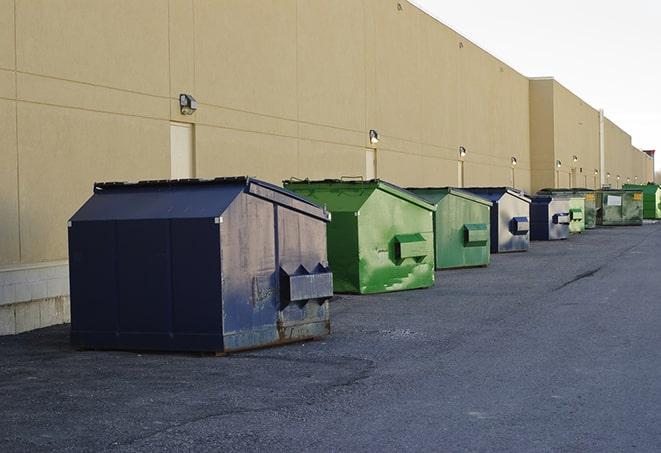 portable, green construction dumpsters serving as a container for scrap materials in Bayfield CO